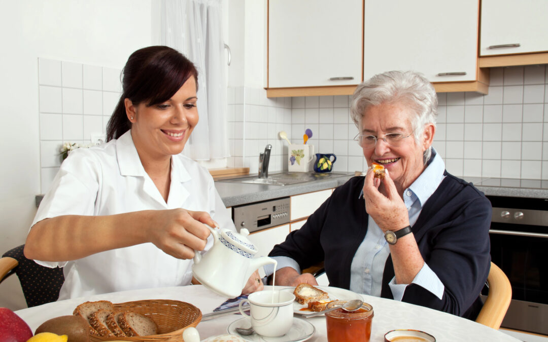 Two women eating at the kitchen table